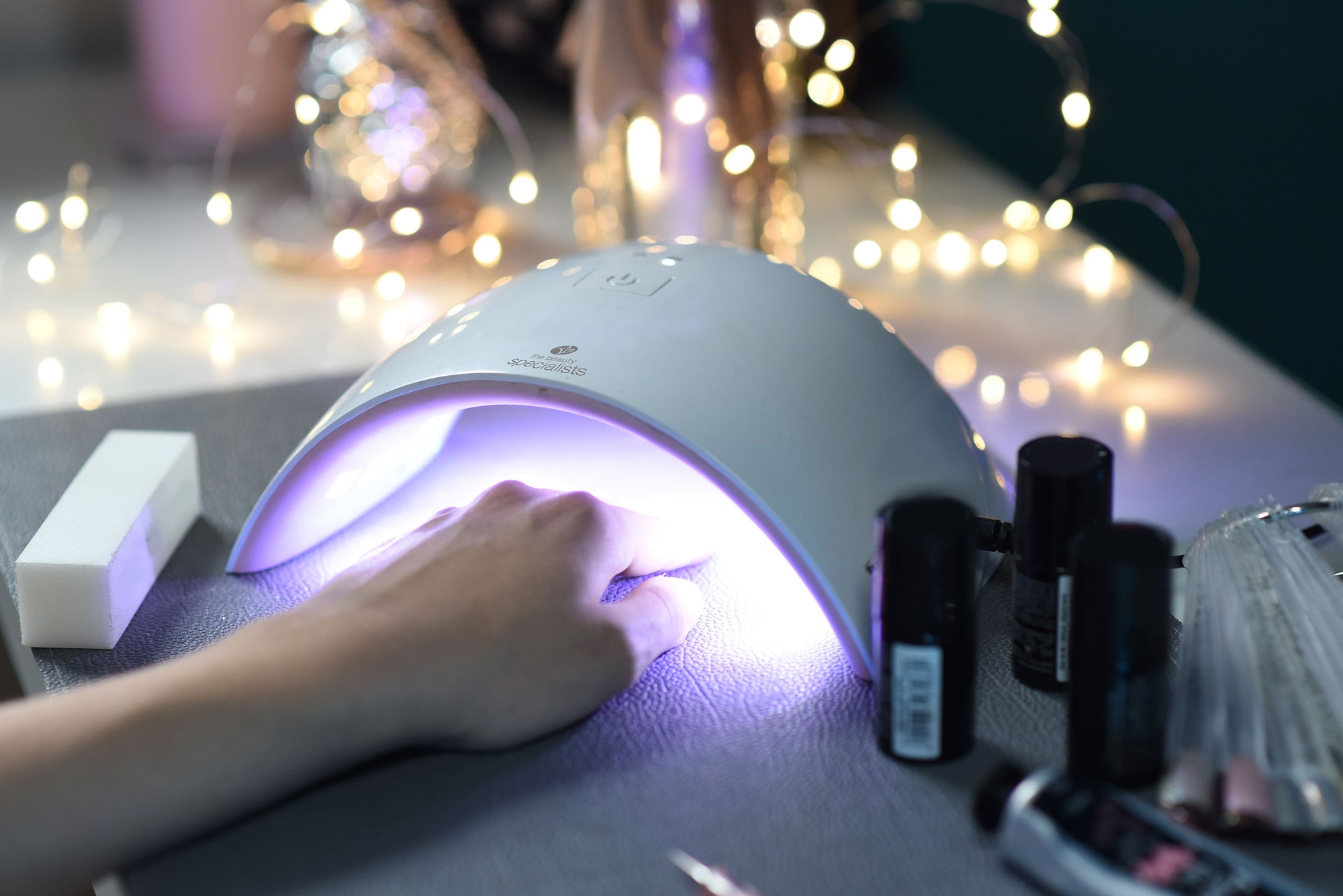 Some using a UV Nail Lamp to cure nail polish